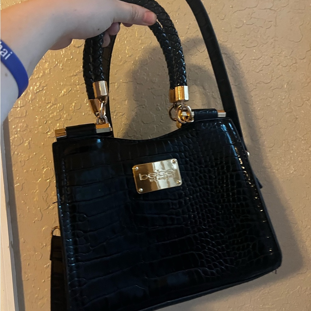 Black Bebe handbag with shoulder strap